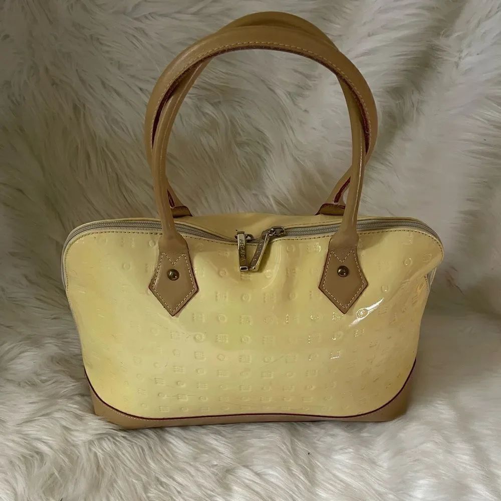 Arcade Genuine Italian patent leather logo yellow and tan satchel dome b…
